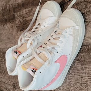 Nike high top leather sneakers.